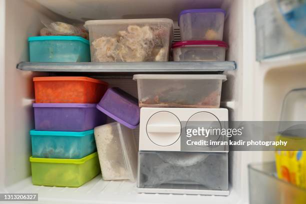 polypropylene storage in refrigerator - frozen food stock pictures, royalty-free photos & images