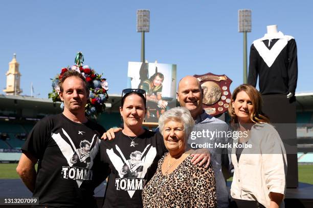 Tommy Raudonikis' wife Trish Brown poses alongside other family members during the Tommy Raudonikis Memorial Service at the Sydney Cricket Ground on...