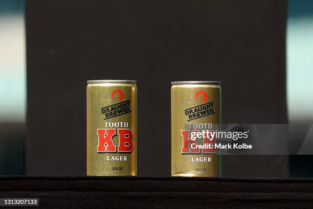 Two KB Lager beer cans is on display during the Tommy Raudonikis Memorial Service at the Sydney Cricket Ground on April 19, 2021 in Sydney,...