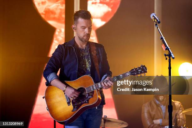 In this image released on April 18, T.J. Osborne of Brothers Osborne performs onstage at the 56th Academy of Country Music Awards at the Ryman...