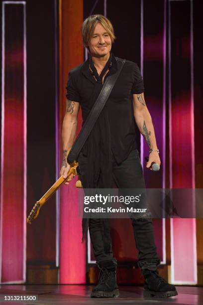 In this image released on April 18, Keith Urban performs onstage at the 56th Academy of Country Music Awards at the Grand Ole Opry on April 18, 2021...