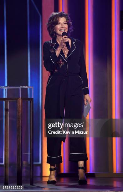 In this image released on April 18, Amy Grant speaks onstage at the 56th Academy of Country Music Awards at the Grand Ole Opry on April 18, 2021 in...