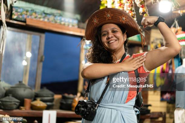 northeastern woman wearing cangaceiro hat - brazilian culture stock pictures, royalty-free photos & images