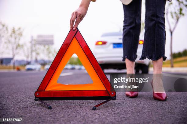 car problems - warning triangle stock pictures, royalty-free photos & images