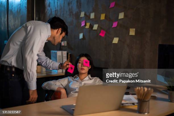 pretend your friends are working overtime in the office. - bullying workplace stock pictures, royalty-free photos & images