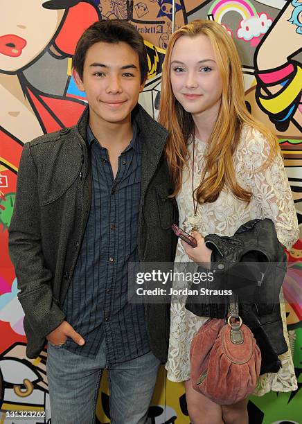 Actor Ryan Potter and guest attend the launch of the MetroPCS Huawei M835 sanctioned by tokidoki at the tokidoki flagship store on November 3, 2011...