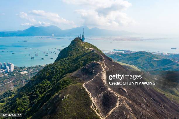 drone view of castle peak transmitting station in hong kong - antenna aerial stock pictures, royalty-free photos & images