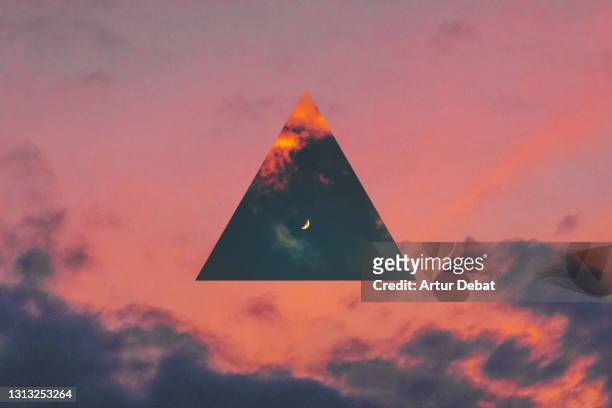 creative picture of dramatic sunset sky with triangle mirror reflection. - espiritualidad fotografías e imágenes de stock