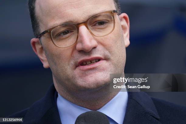 German Health Minister Jens Spahn speaks at the opening of a Covid testing station operated by German drugstore chain DM at the Mall of Berlin...