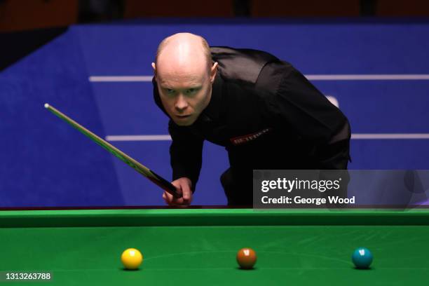 Gary Wilson of England prepares to play a shot during the Betfred World Snooker Championship Round One match between Gary Wilson of England and Kyren...