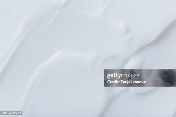 cosmetic cream texture. white lotion, moisturizer, creamy beauty product background - 乳液 ストックフォトと画像