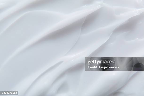 cosmetic cream texture. white lotion, moisturizer, creamy beauty product background - 乳液 ストックフォトと画像