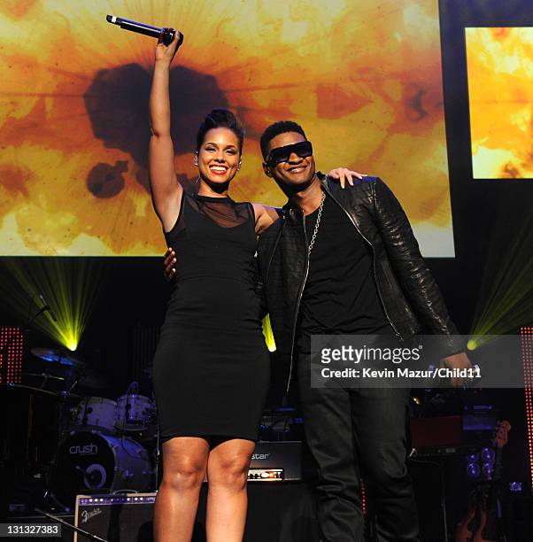 Alicia Keys and Usher perform on stage at Keep A Child Alive's 8th annual Black Ball at Hammerstein Ballroom on November 3, 2011 in New York City.