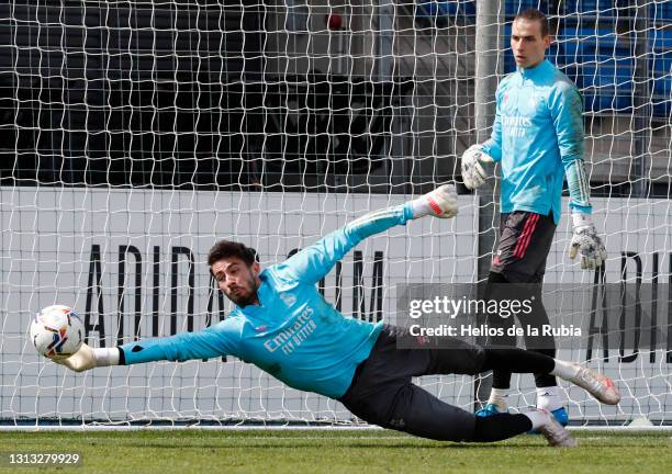 Diego Altube and Andriy Lunin of Real Madrid during a training session at Valdebebas training ground on April 19, 2021 in Madrid, Spain.