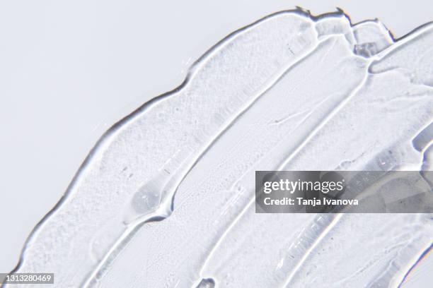 texture of gel cream. liquid hyaluronic acid gel on white background. - gelatin mold fotografías e imágenes de stock