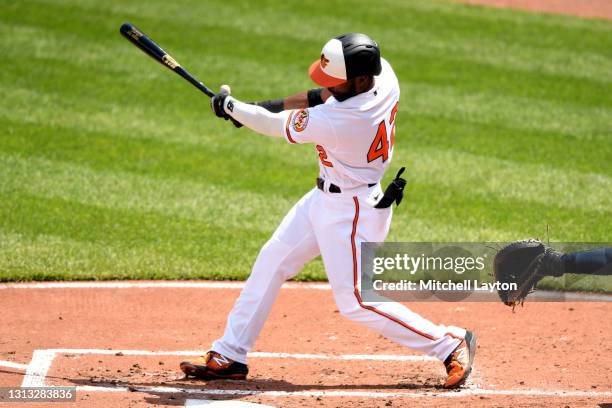 Cedric Mullins of the Baltimore Orioles takes a swing during game one of a doubleheader baseball game against the Seattle Mariners at Oriole Park at...