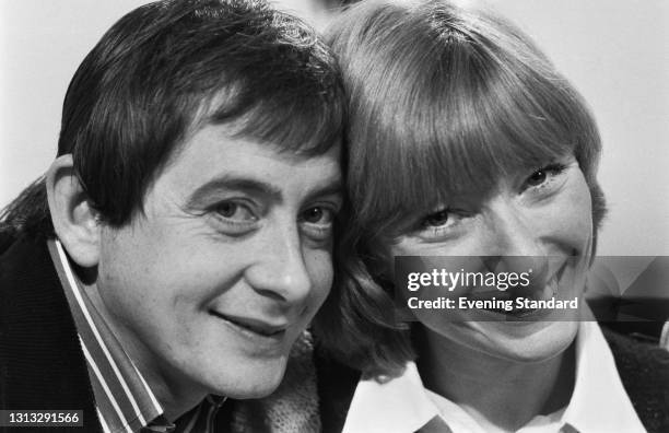 English actor Derek Fowlds and 'Blue Peter' presenter Lesley Judd after the announcement of their engagement, UK, 6th December 1973.