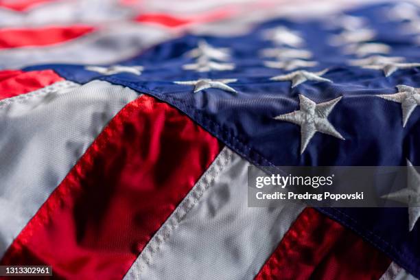 dramatic and dark usa flag background - american flag on stage stock pictures, royalty-free photos & images