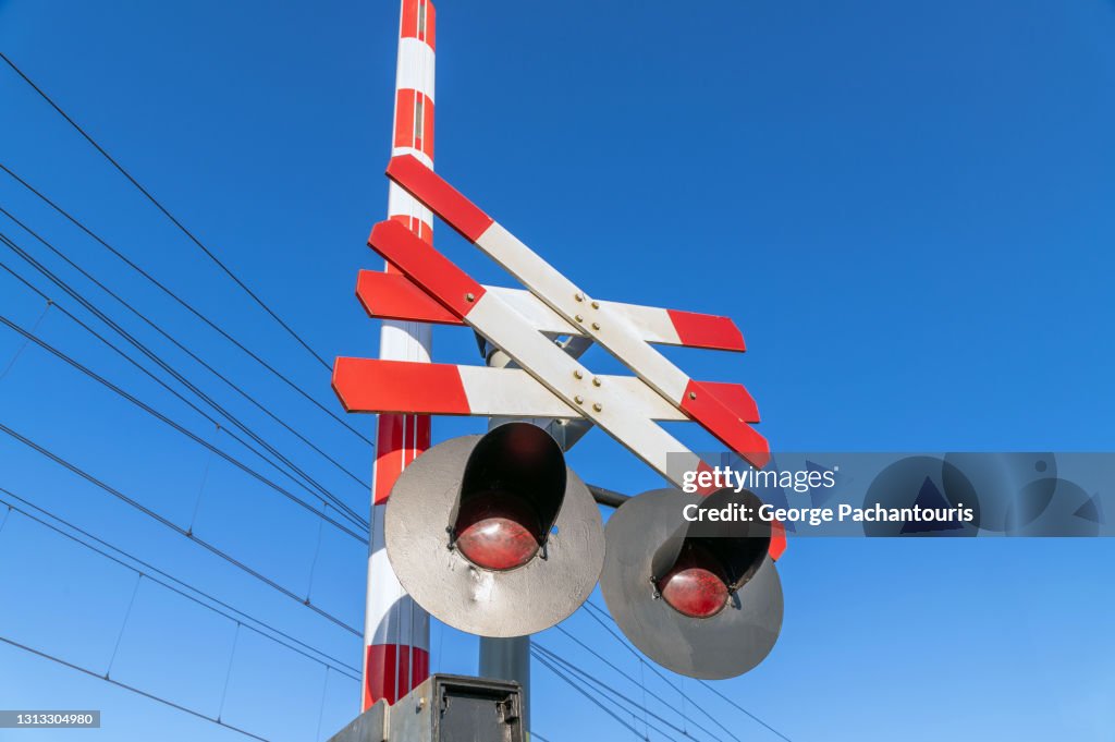 Low angle view of railway signal on a crossing