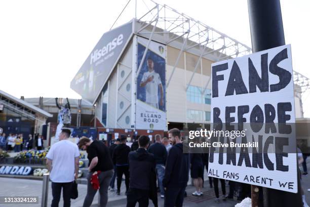 Fan sign is seen reading "Fans before finance, All fans aren't we" as a protest against the European Super League outside the stadium prior to the...