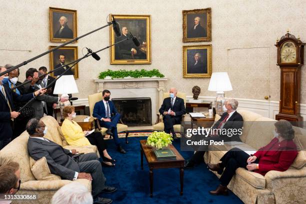 President Joe Biden speaks during a meeting with a bipartisan group of members of Congress to discuss investments in the American Jobs Plan,...
