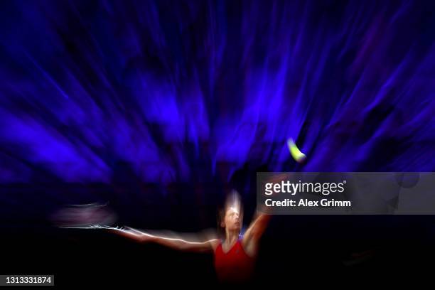 Andrea Petkovic of Germany serves on day 3 of the Porsche Tennis Grand Prix between Maria Sakkari of Greece and Andrea Petkovic of Germany at Porsche...