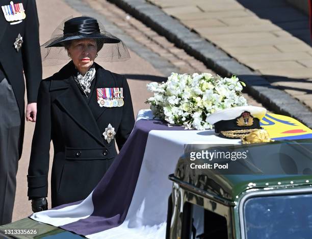 Princess Anne, Princess Royal follows Prince Philip, Duke of Edinburgh's coffin as it is carried on a specially designed Land Rover Defender hearse...