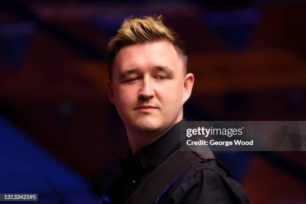 Kyren Wilson of England reacts during the Betfred World Snooker Championship Round One match between Gary Wilson of England and Kyren Wilson of...