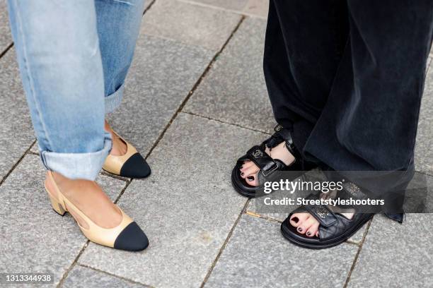 Beige and black singleback pumps by Chanel as a detail of Influencer Gitta Banko and black chunky dad sandals by Chanel as a detail of Influencer...