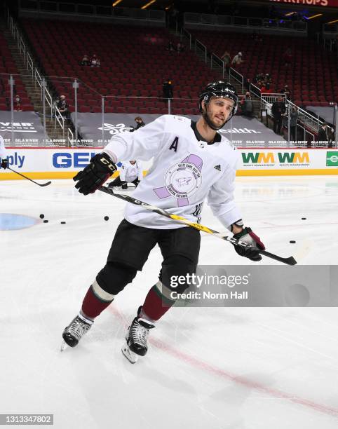 Niklas Hjalmarsson of the Arizona Coyotes wears a special warm-up jersey honoring 9 year old Leighton Accardo prior to the NHL hockey game against...