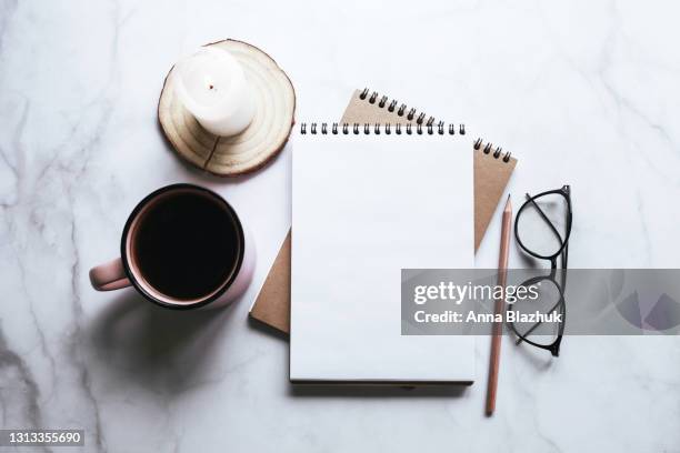 still life of note pad, eyeglasses, pencil and cup of coffee. copy space for text. creativity concept. - candle overhead stock pictures, royalty-free photos & images
