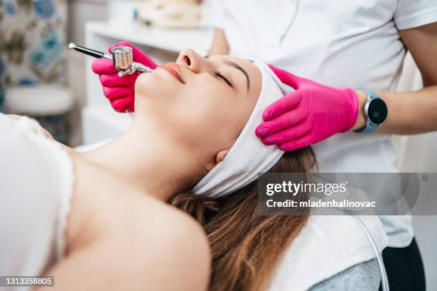 professional beauty treatment - tighten stock pictures, royalty-free photos & images