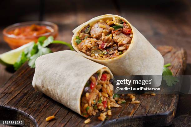 mexican rice and chorizo sausage wrap - tortilla stock pictures, royalty-free photos & images
