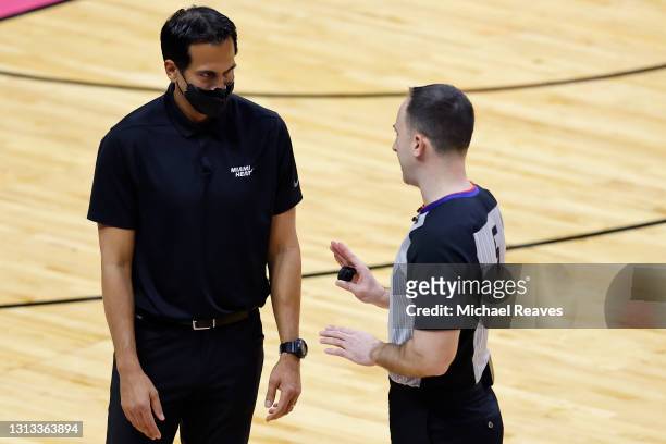 Head coach Erik Spoelstra of the Miami Heat argues a foul call with referee Kane Fitzgerald against the Toronto Raptors during the third quarter at...