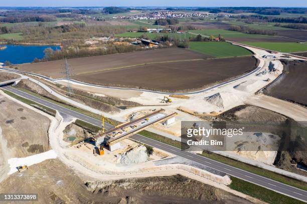 aerial view of bridge under construction - roadworks stock pictures, royalty-free photos & images