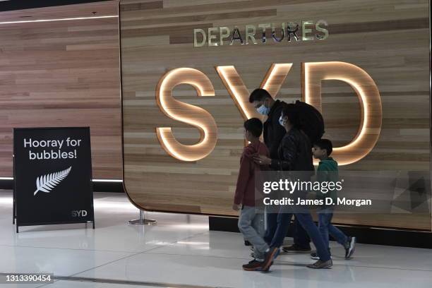 Passengers about to go through security out of Sydney's International Airport en route from Australia to New Zealand on April 19, 2021. The...