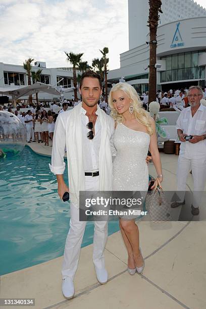 Singer Josh Strickland and model and television personality Holly Madison attend the Nikki Beach Grand Opening White Party at Tropicana Las Vegas on...