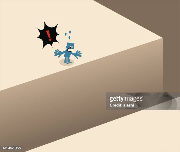 one blue man standing at the edge of the cliff gap having no idea how to cross it - generation gap stock illustrations