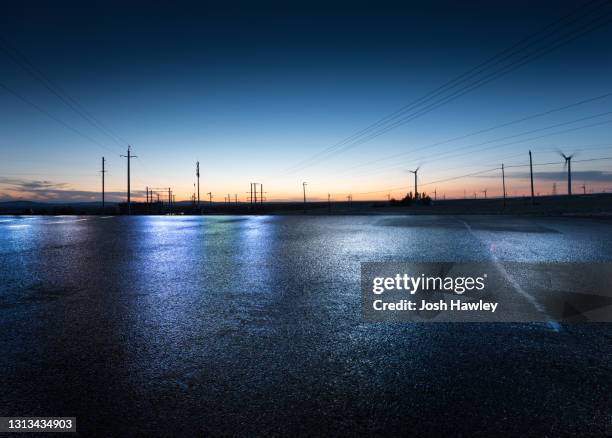 outdoor parking lot - puddle reflection stock pictures, royalty-free photos & images