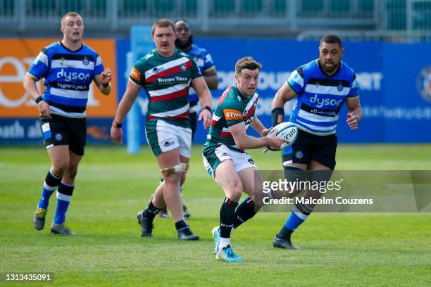 George Ford of Leicester Tigers runs with the ball during the Gallagher Premiership Rugby match between Bath and Leicester Tigers at The Recreation...