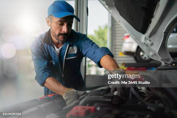 garage service auto shop. man owner small business - car mechanic stock pictures, royalty-free photos & images