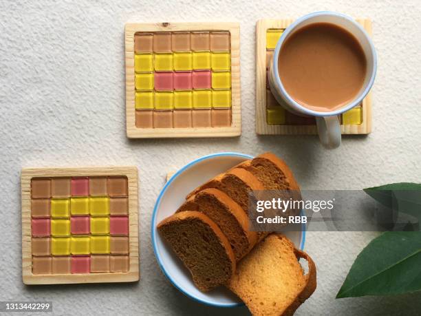 morning tea - coaster stock pictures, royalty-free photos & images