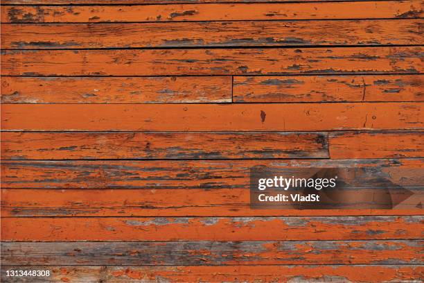 barn wood panels with cracked peeling paint orange brown grunge vector background - crate texture stock illustrations