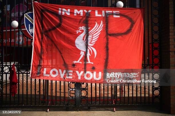 Banners and football scarves are tied to the fences around Anfield Stadium, the home of Liverpool Football Club, in protest at the club's intentions...