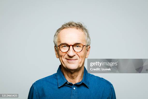 headshot of friendly senior man - contented emotion photos stock pictures, royalty-free photos & images