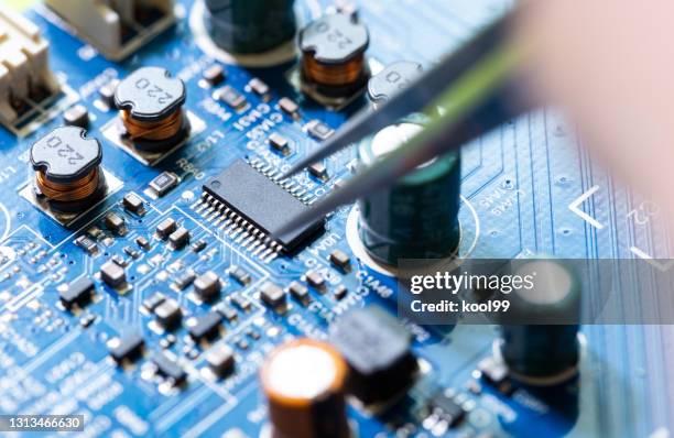 repair circuit boards - resistor stock pictures, royalty-free photos & images