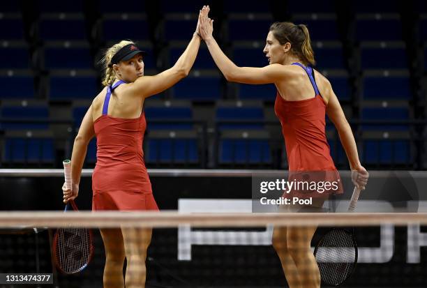 Angelique Kerber of Germany celebrate with Andrea Petkovic of Germany during their Womens Doubles match against Lyudmyla Kichenok of Ukraine and...