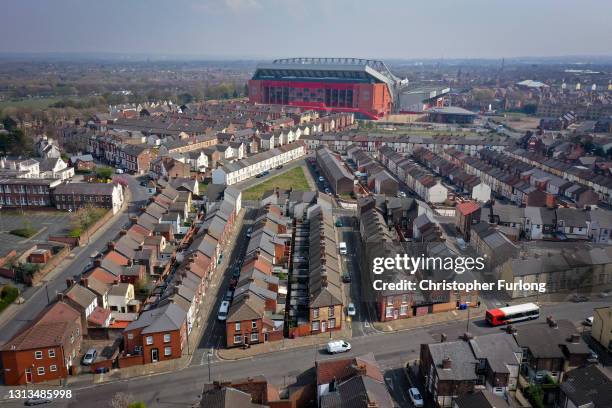 In an aerial view, terraced homes surround Anfield stadium, the home of Liverpool Football Club, after the club disclosed its intentions to join the...