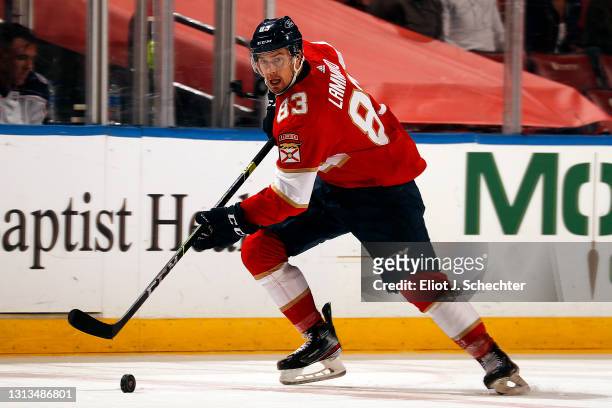 Juho Lammikko of the Florida Panthers skates with the puck against the Columbus Blue Jackets at the BB&T Center on April 19, 2021 in Sunrise, Florida.