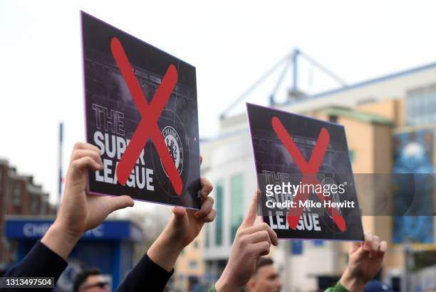 Chelsea fans protest against the newly proposed European Super League prior to the Premier League match between Chelsea and Brighton & Hove Albion at...